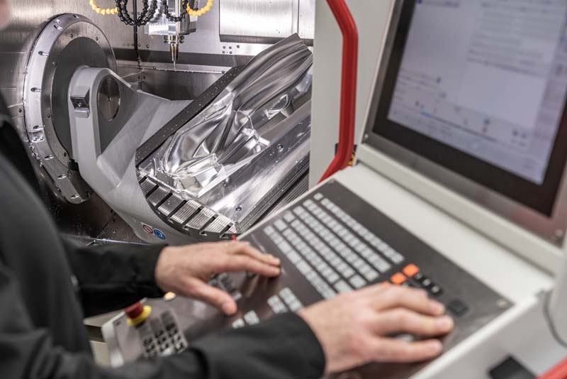 Autodesk customer, Hermle AG, uses PowerMill to create its machines. Here they are milling the PowerMill hero object from metal. 
